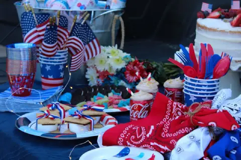 Fourth of July home hosting tips shown in a cool and comfortable North Texas living room prepared for family guests.