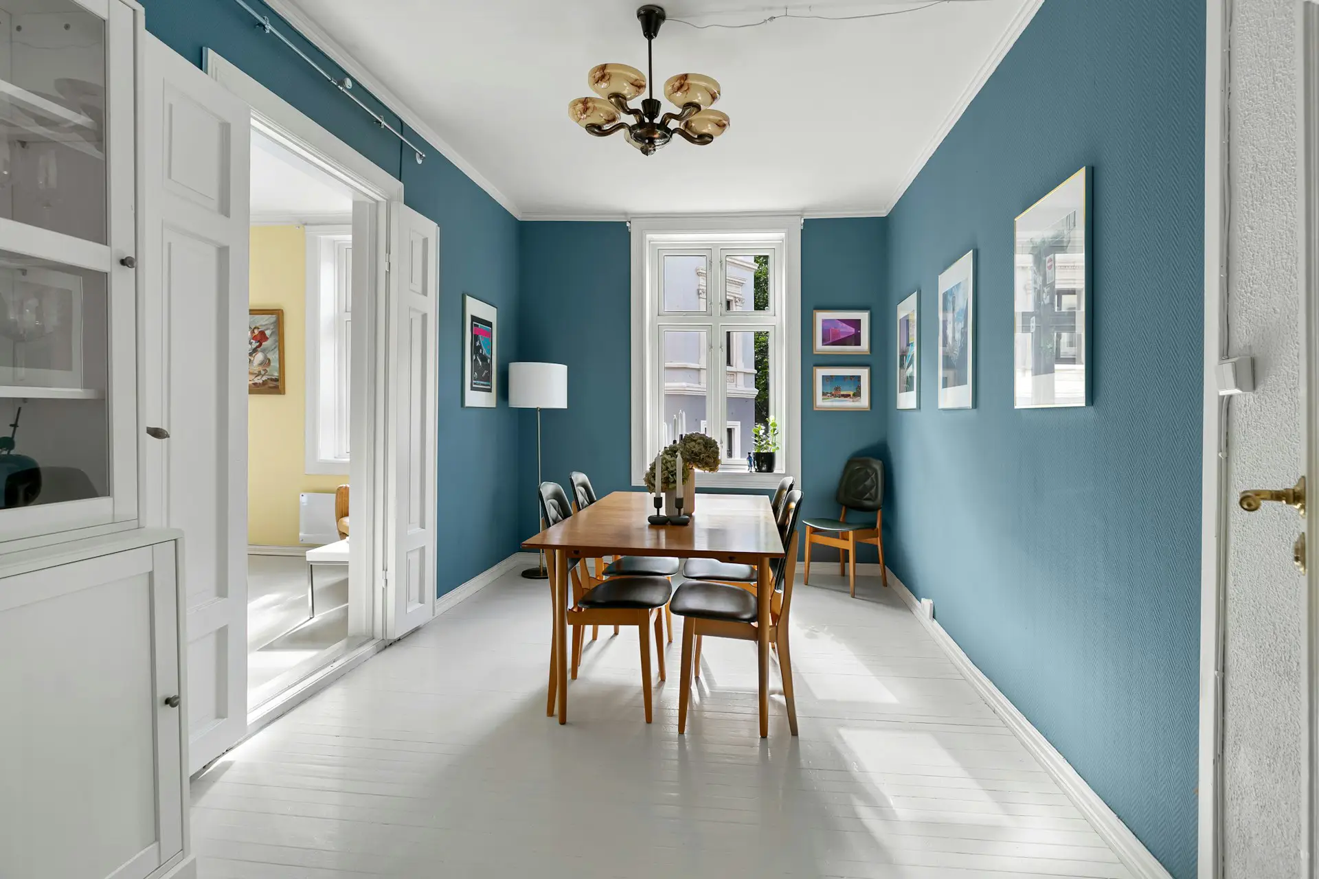PaintMor Painters blog summer interior painting project ideas in Frisco, a light multi colored dining room and living room