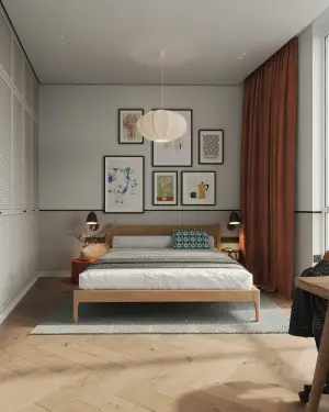 A bedroom with a bed and a table with multi tone painted walls