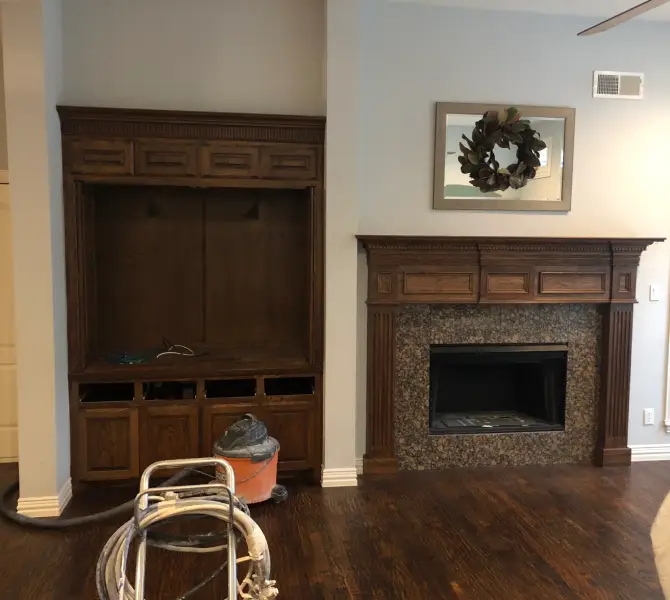 a room with a fireplace and a vacuum cleaner How To Choose Paint Colors For Your Home in 2025